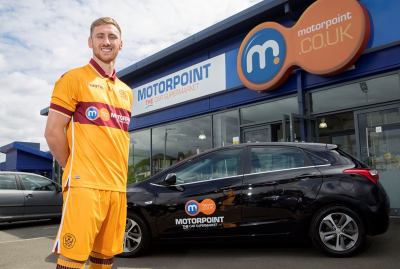 Motherwell striker Louis Moult help launch the new Motorpoint branded first team kit Motherwell striker Louis Moult help launch the new Motorpoint branded first team kit