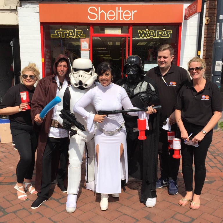 Tara Haley, Branch Manager for Shelter Derby, centre is pictured with the Motorpoint team outside the Shelter store on St Peters Lane in the city Tara Haley, Branch Manager for Shelter Derby, centre is pictured with the Motorpoint team outside the Shelter store on St Peters Lane in the city