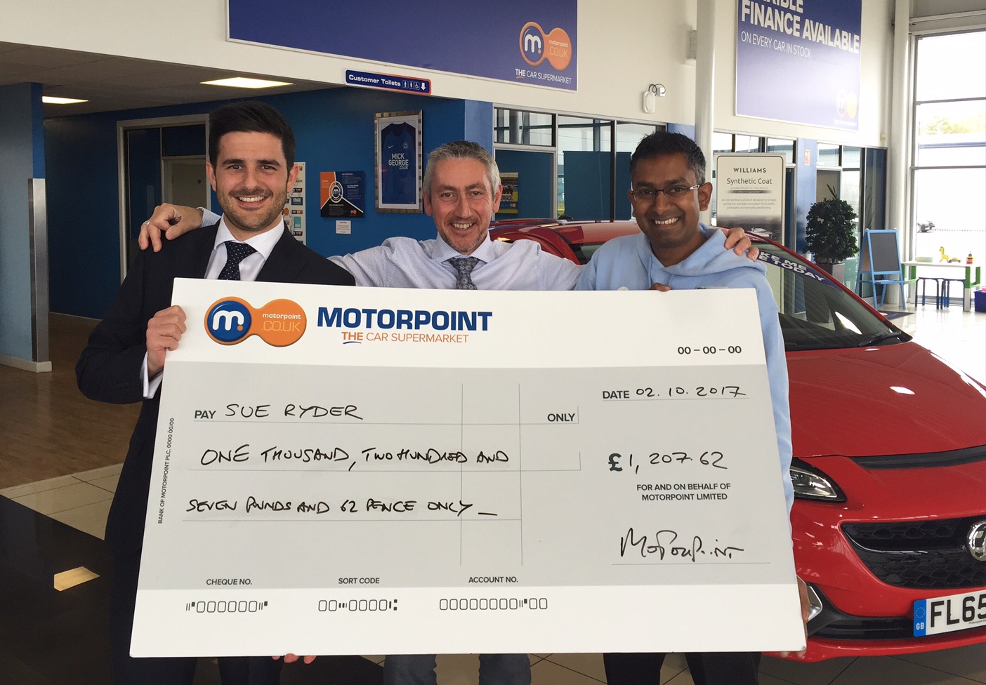Tom Stanton, General Manager of Motorpoint in Peterboroug, hands over a cheque to Nilesh Patel from Sue Ryder Thorpe Hall in Peterborough Tom Stanton, General Manager of Motorpoint in Peterboroug, hands over a cheque to Nilesh Patel from Sue Ryder Thorpe Hall in Peterborough