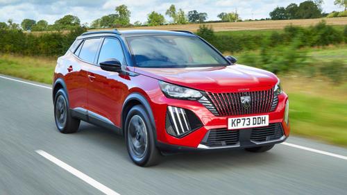 Peugeot 2008 review header image front 3/4 driving