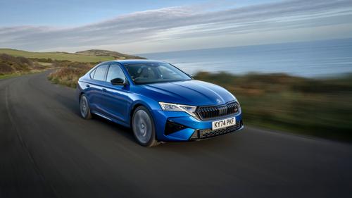 2025 Skoda Octavia vRS hatch front driving hero