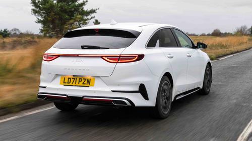 Kia ProCeed driving rear view 