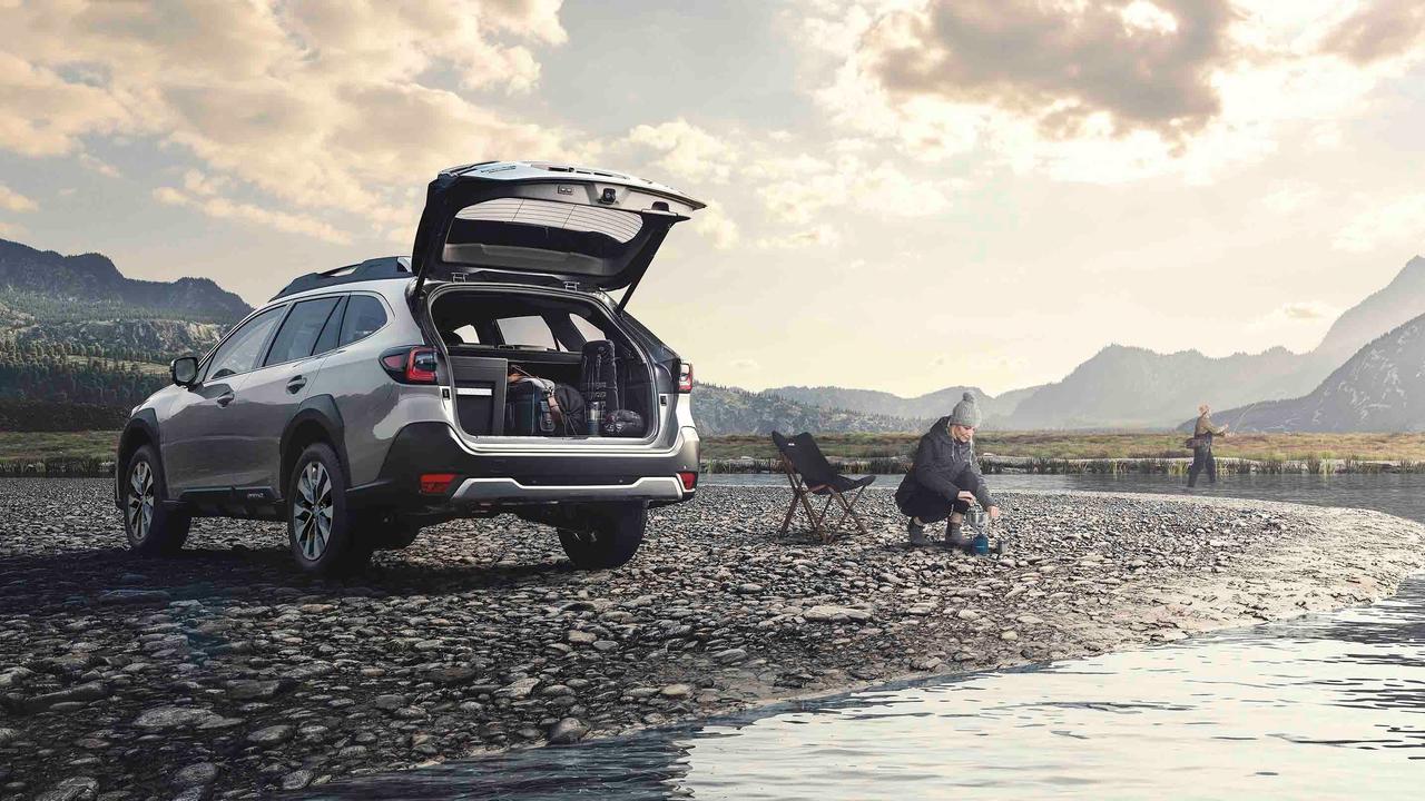 Subaru Outback with boot open in scenic location
