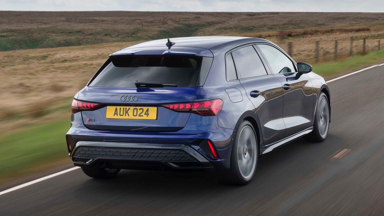 Audi A3 driving rear view