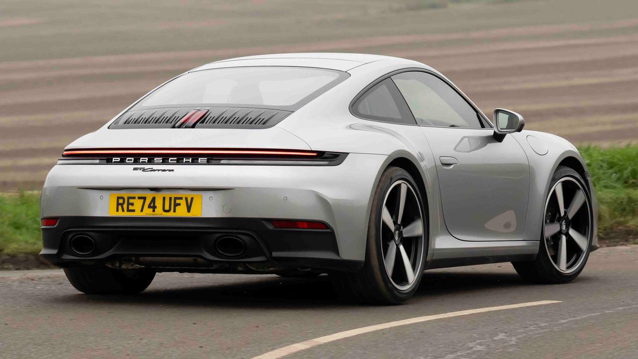 Porsche 911 driving rear view