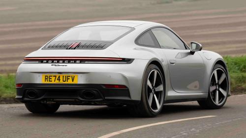 Porsche 911 driving rear view