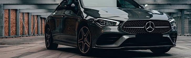 Dark grey Mercedes A-Class saloon