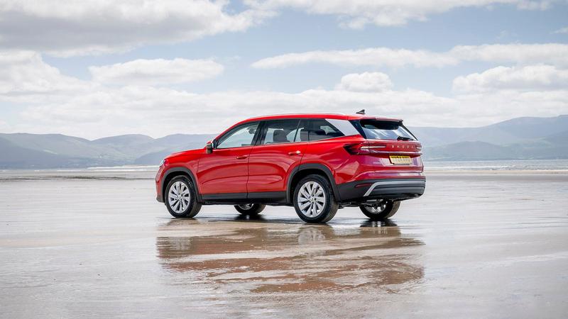 Skoda Kodiaq in red, rear three quarter static on a beach