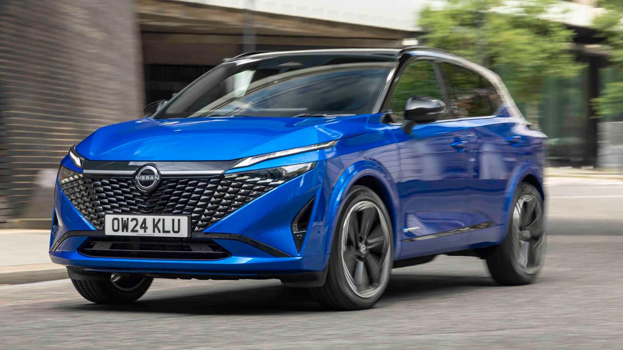 2024 Nissan Qashqai in blue, driving