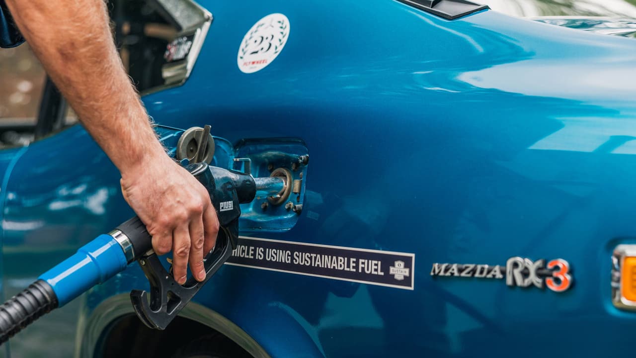 Mazda RX-3 being filled up with synthetic fuel