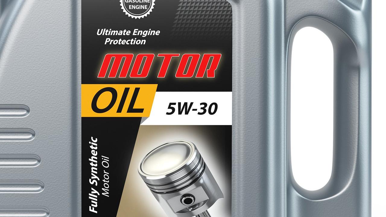 Closeup of engine oil in a bottle with 5W-30 grade on the label