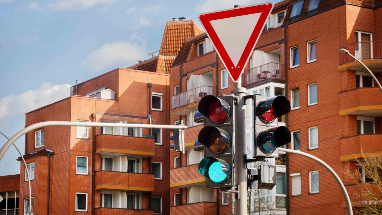 German road sign and traffic light