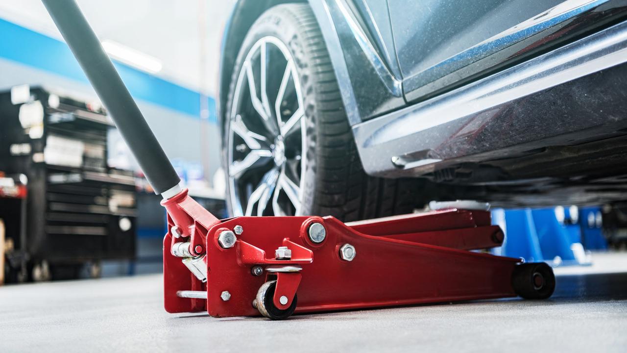 Car jack under car