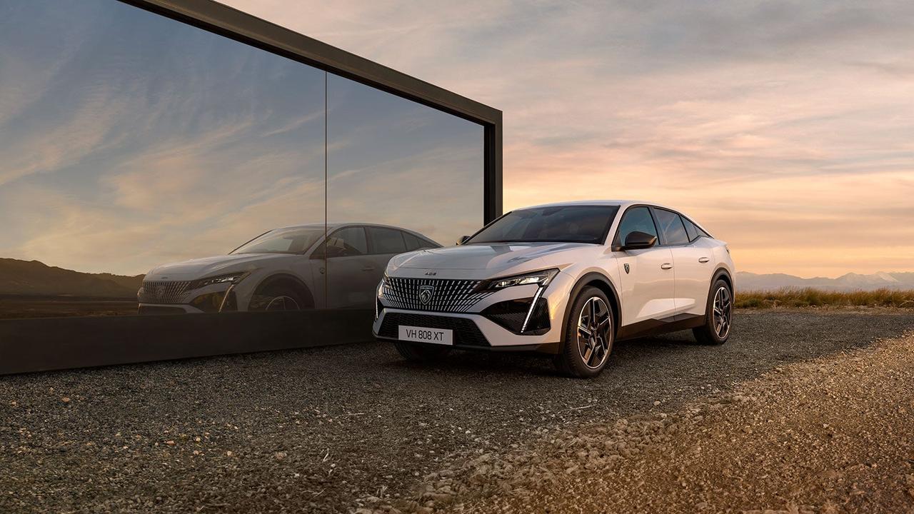 Peugeot e-408 in white, static