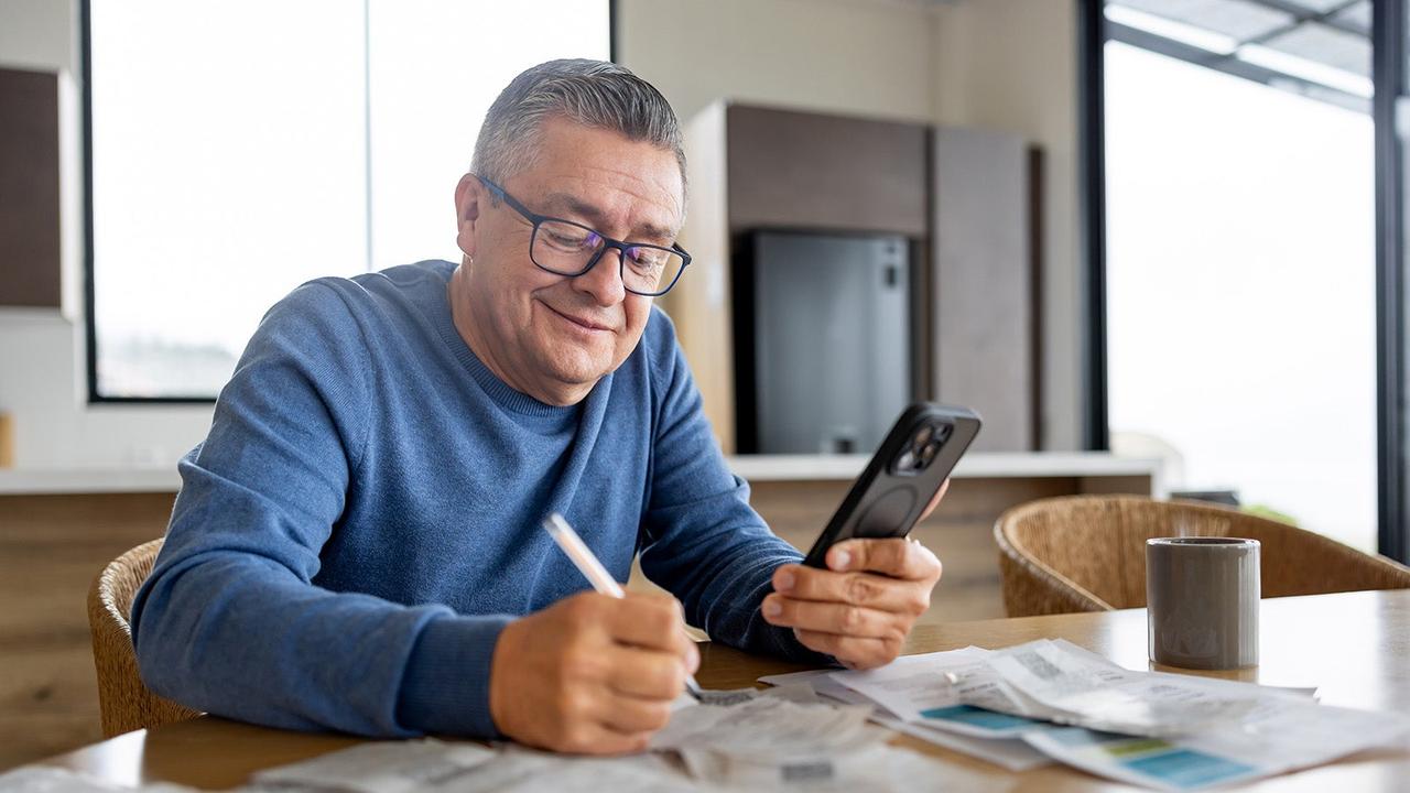 Man on phone with finance provider