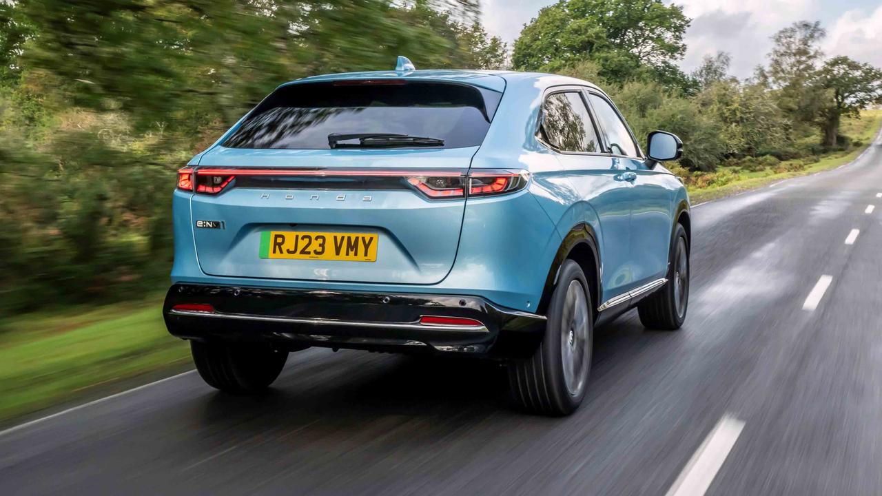 Honda e:Ny1 driving rear view