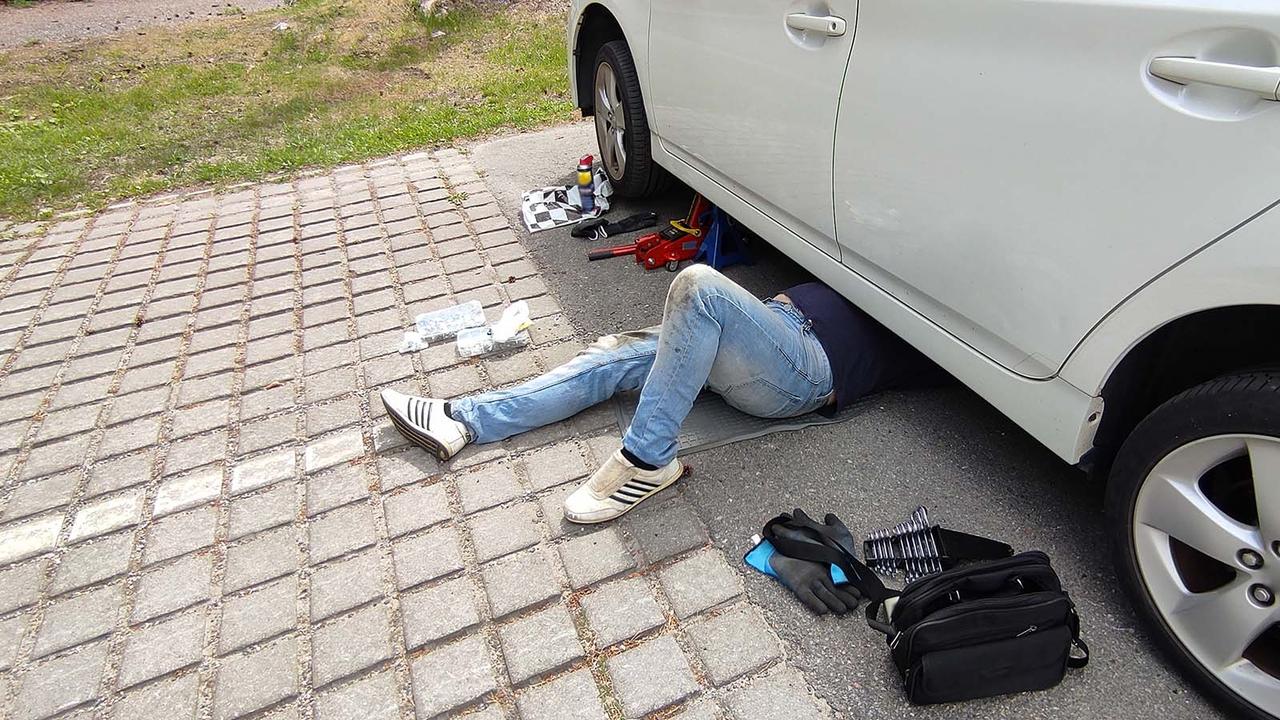 Person servicing their own car