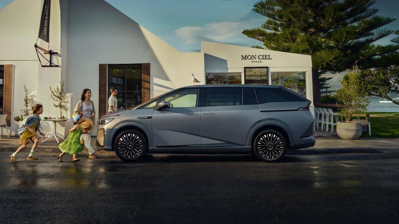 XPeng X9 side view with family