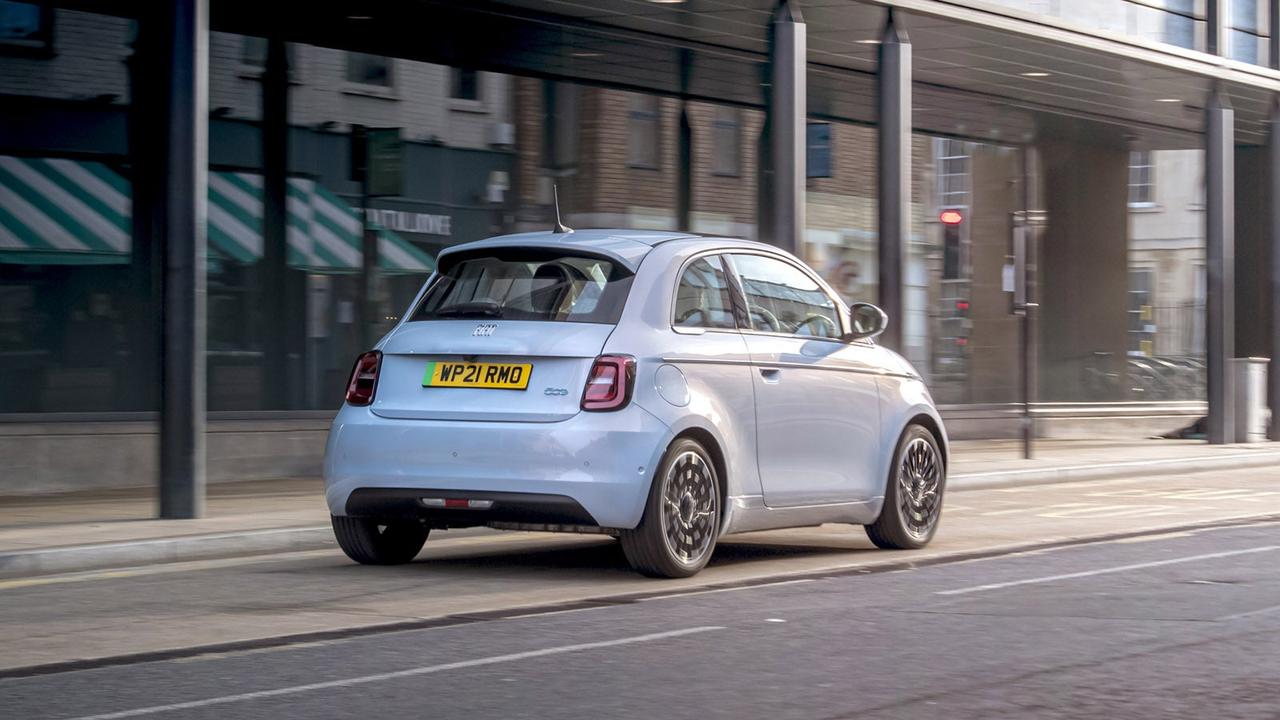 Fiat 500 in light blue, rear three quarter