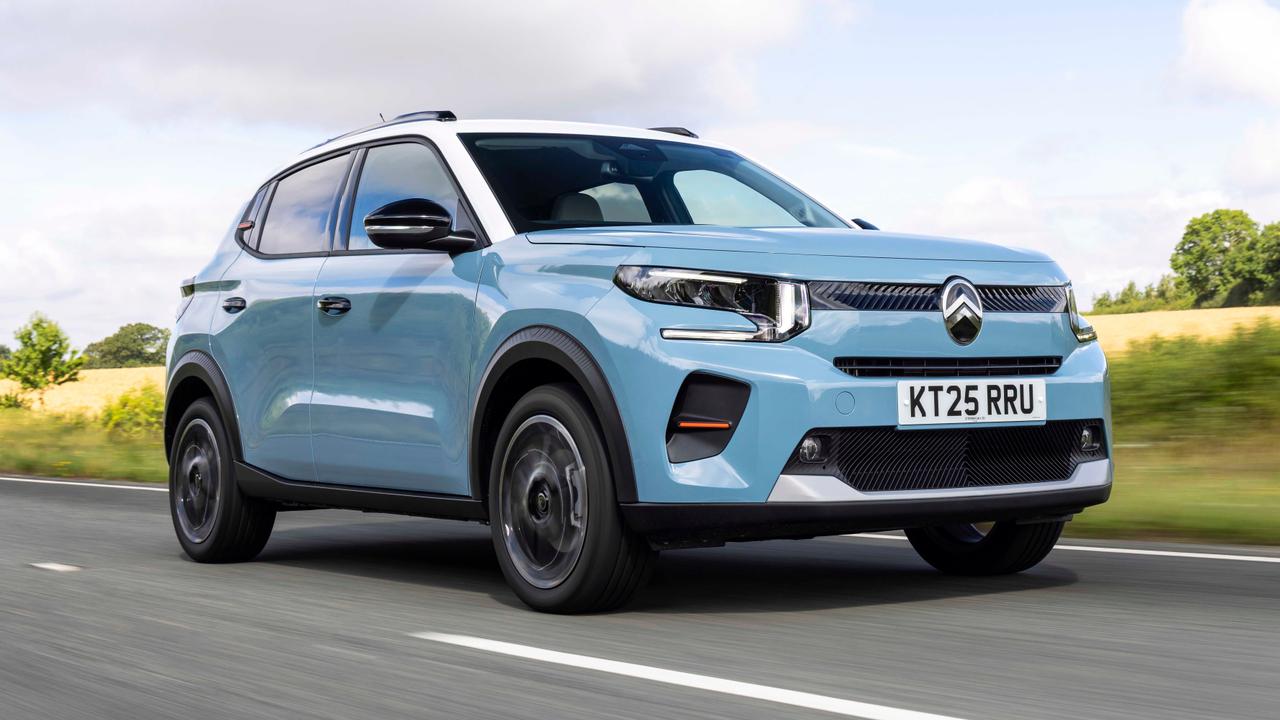 Blue Citroen C3 driving