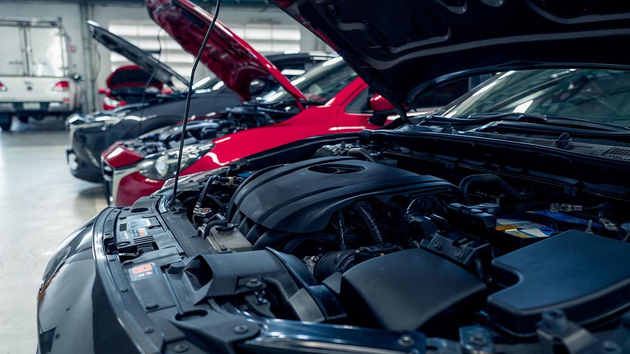 Cars with bonnets open