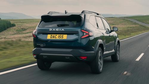 Dacia Bigster driving rear view