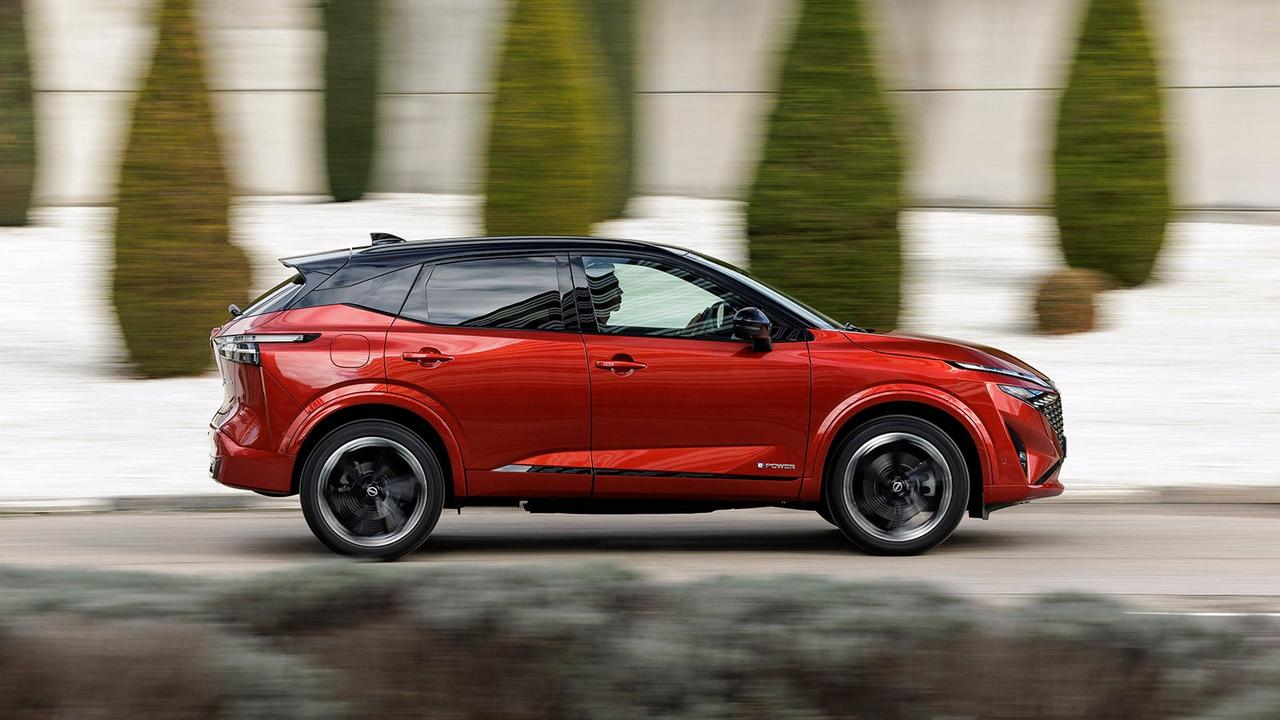 Nissan Qashqai in red, side shot