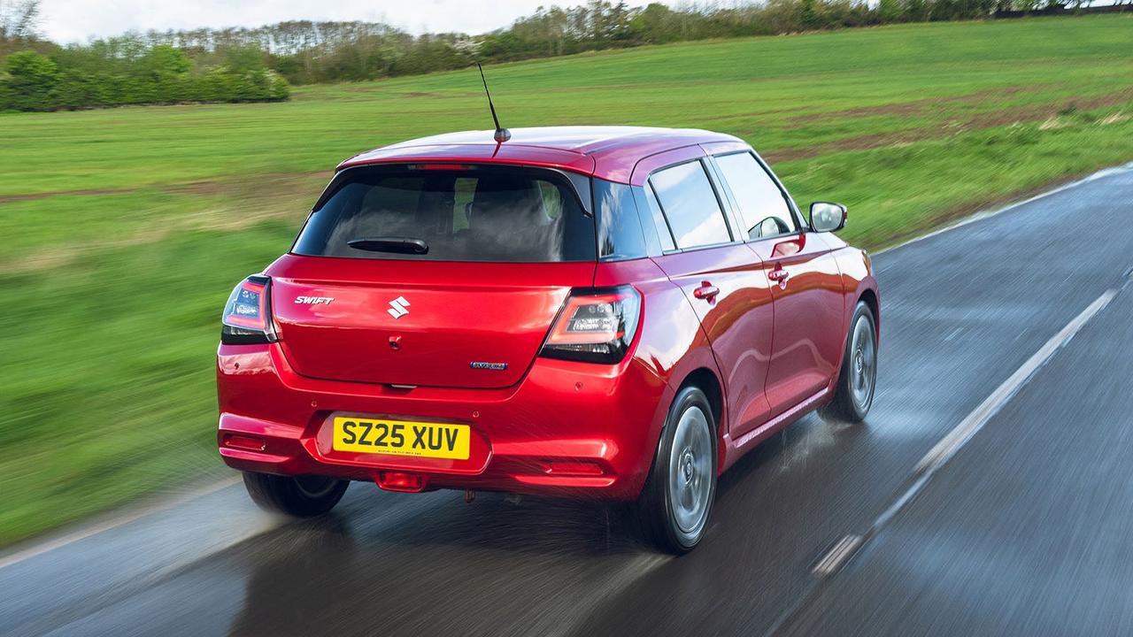 Suzuki Swift in red, rear three quarter