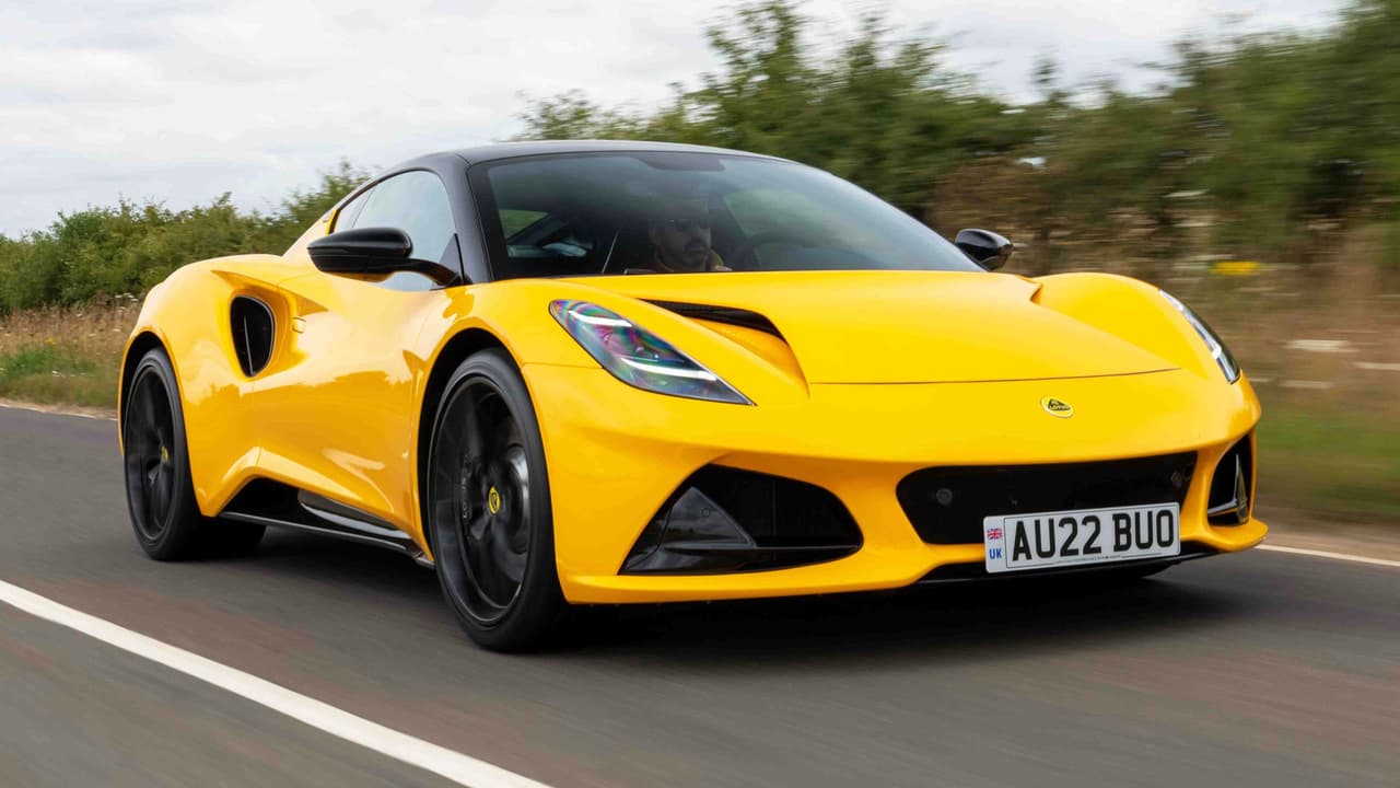 Lotus Emira driving, yellow