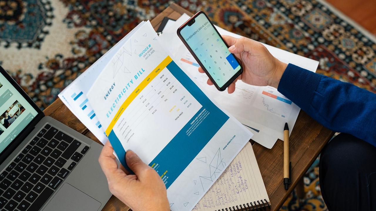 Person working out monthly costs