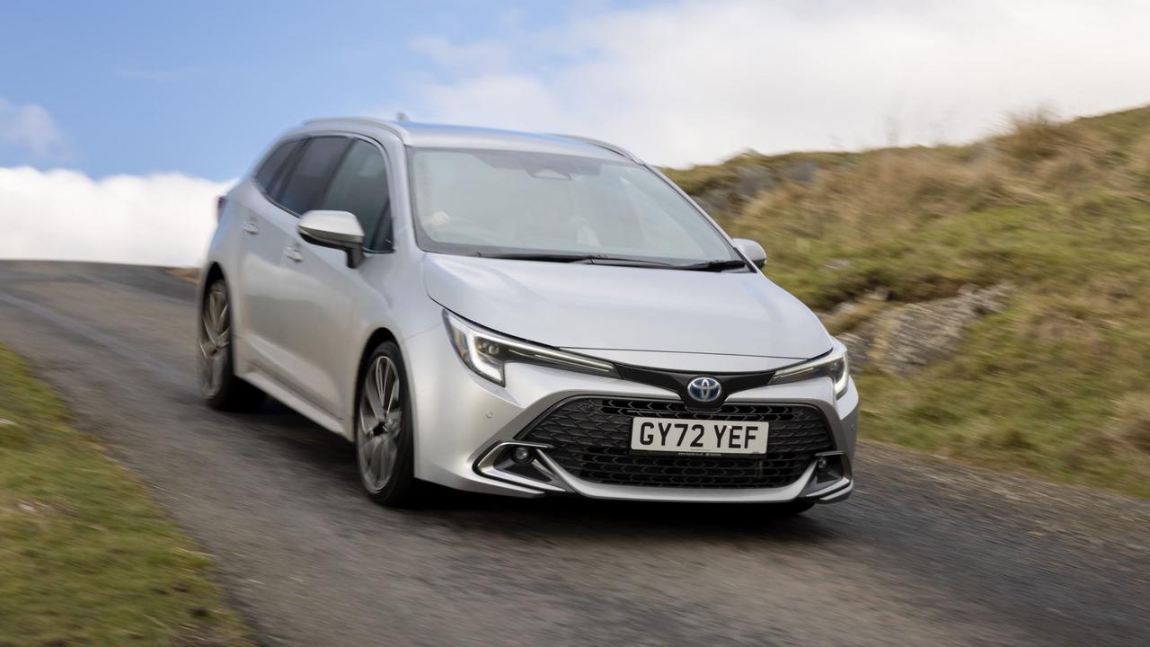 Toyota Corolla Touring Sports driving downhill