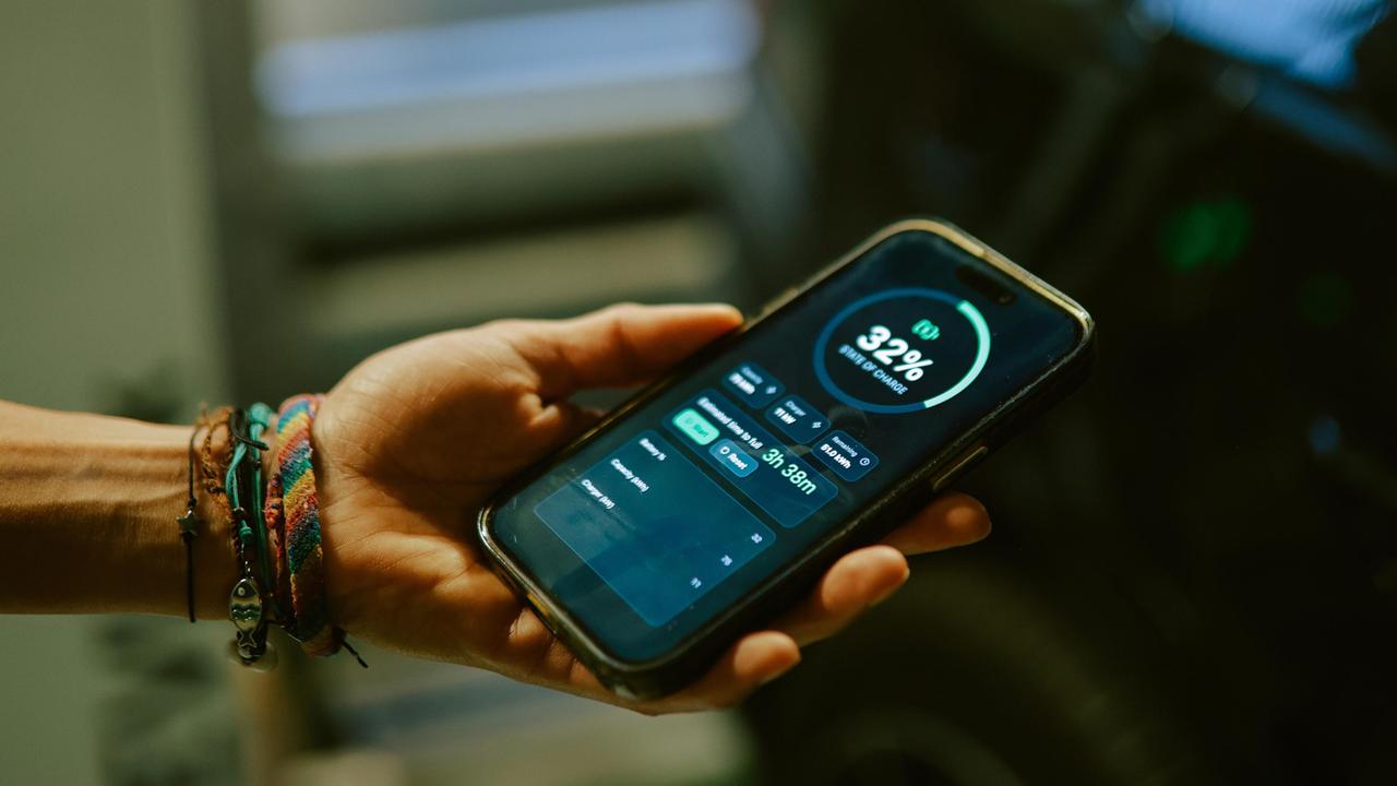 Phone app EV charging screen stock photo