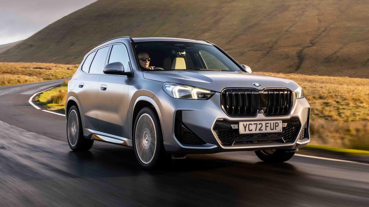 BMW X1 M Sport driving, silver