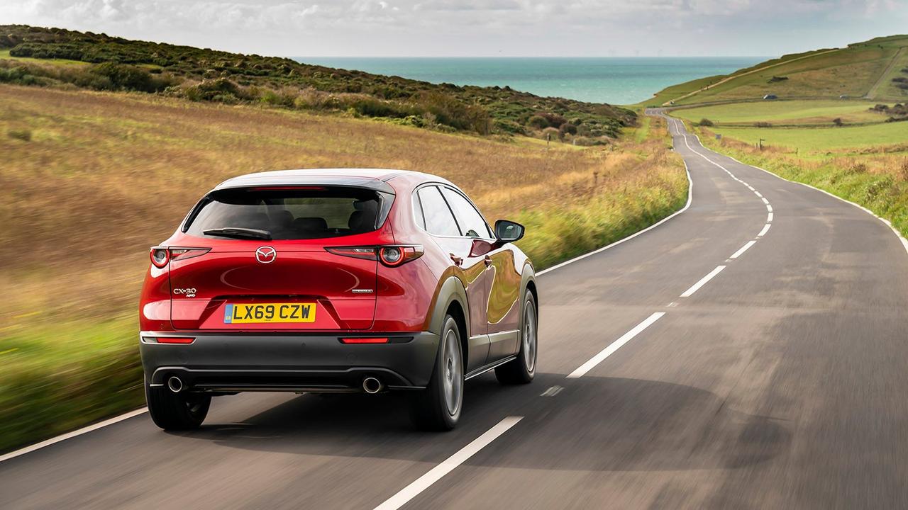 Mazda CX-30 in red rear three quarter