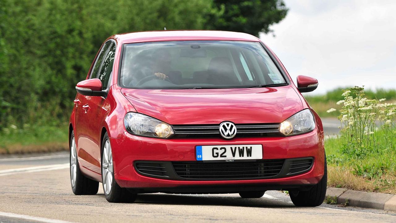 Red VW Golf Mk6 Match driving