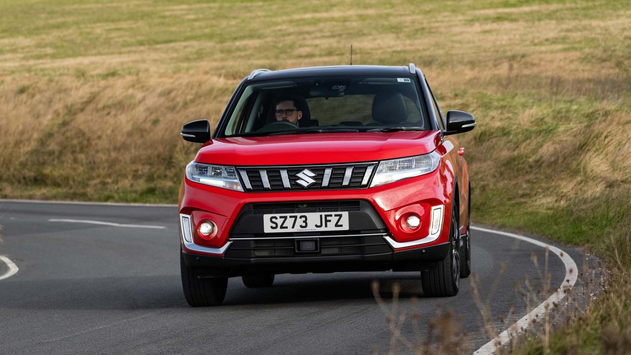 Suzuki Vitara driving on country road