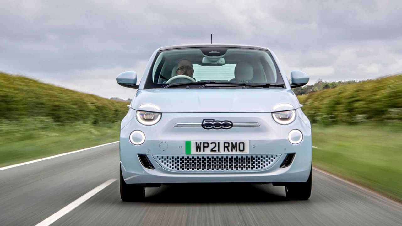 Fiat 500e driving, front end view