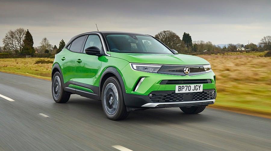 green vauxhall mokka driving