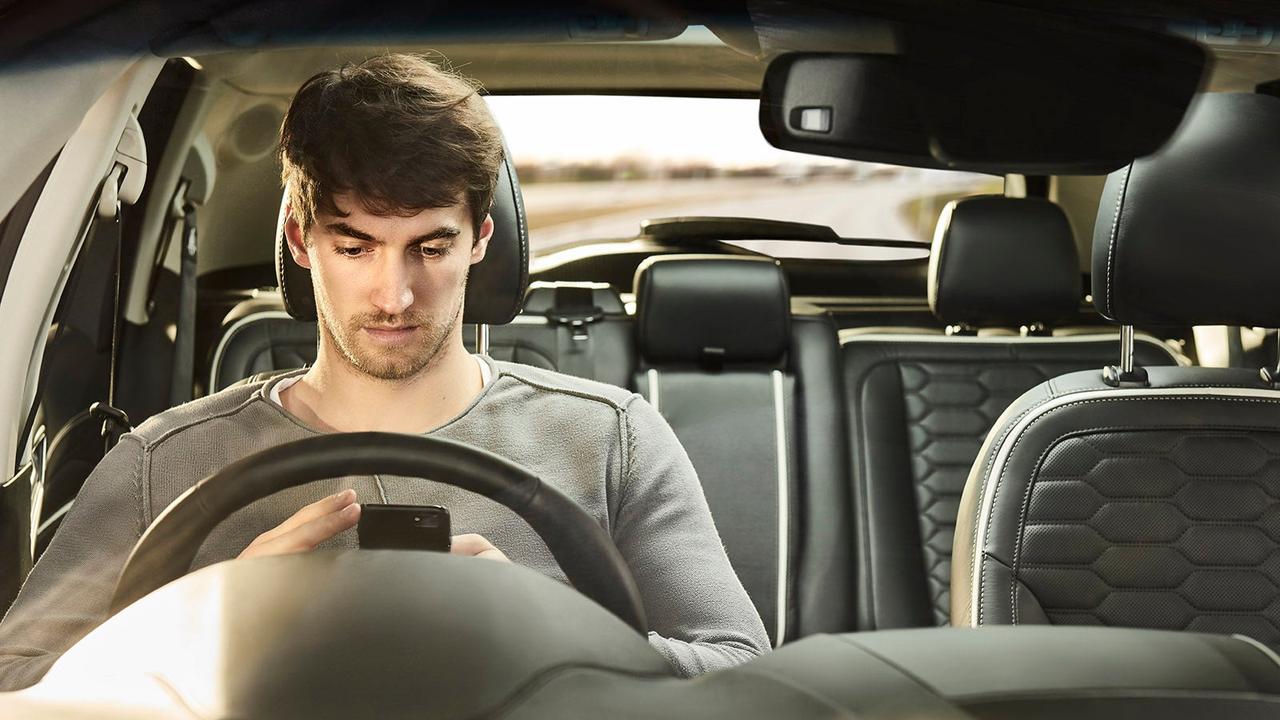 Ford driver on phone