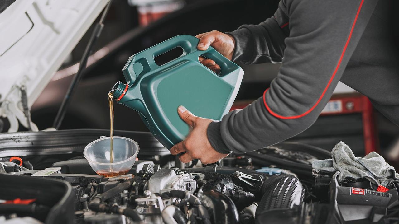Oil change in an engine bay