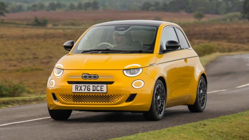 Fiat 500 Hybrid driving on country road