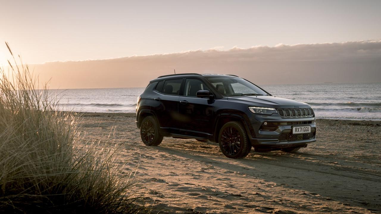 Jeep Compass parked on beach