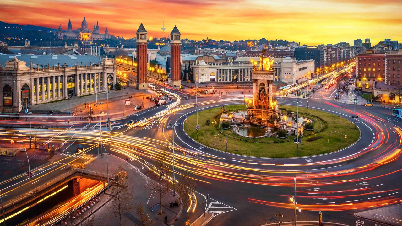 European city at sunset, roundabout with long exposure car light trails