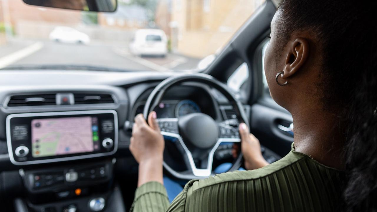 Driver driving an EV