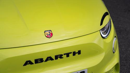 Abarth 500e review – headlight and badge detail