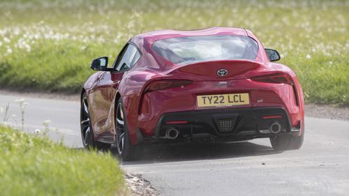 Toyota GR Supra driving rear view
