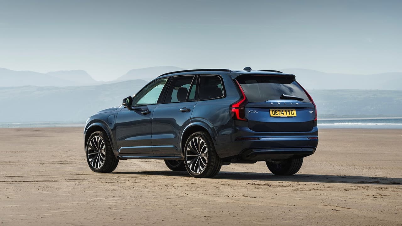 Volvo XC90 in blue, rear three quarter