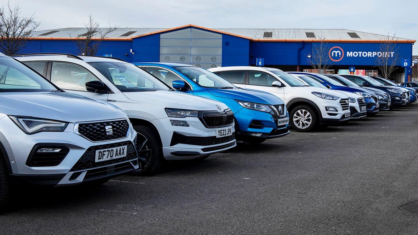 cars lined up Motorpoint Widnes store