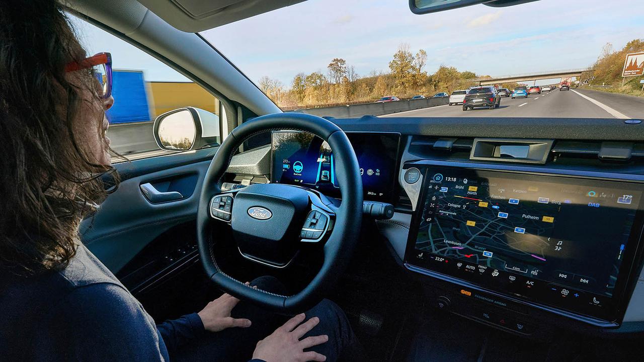 Driver using Ford BlueCruise in a Puma