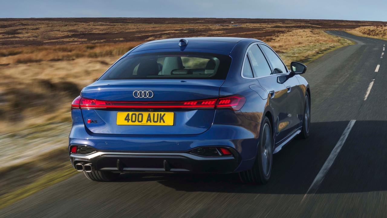 New Audi A5 driving rear view